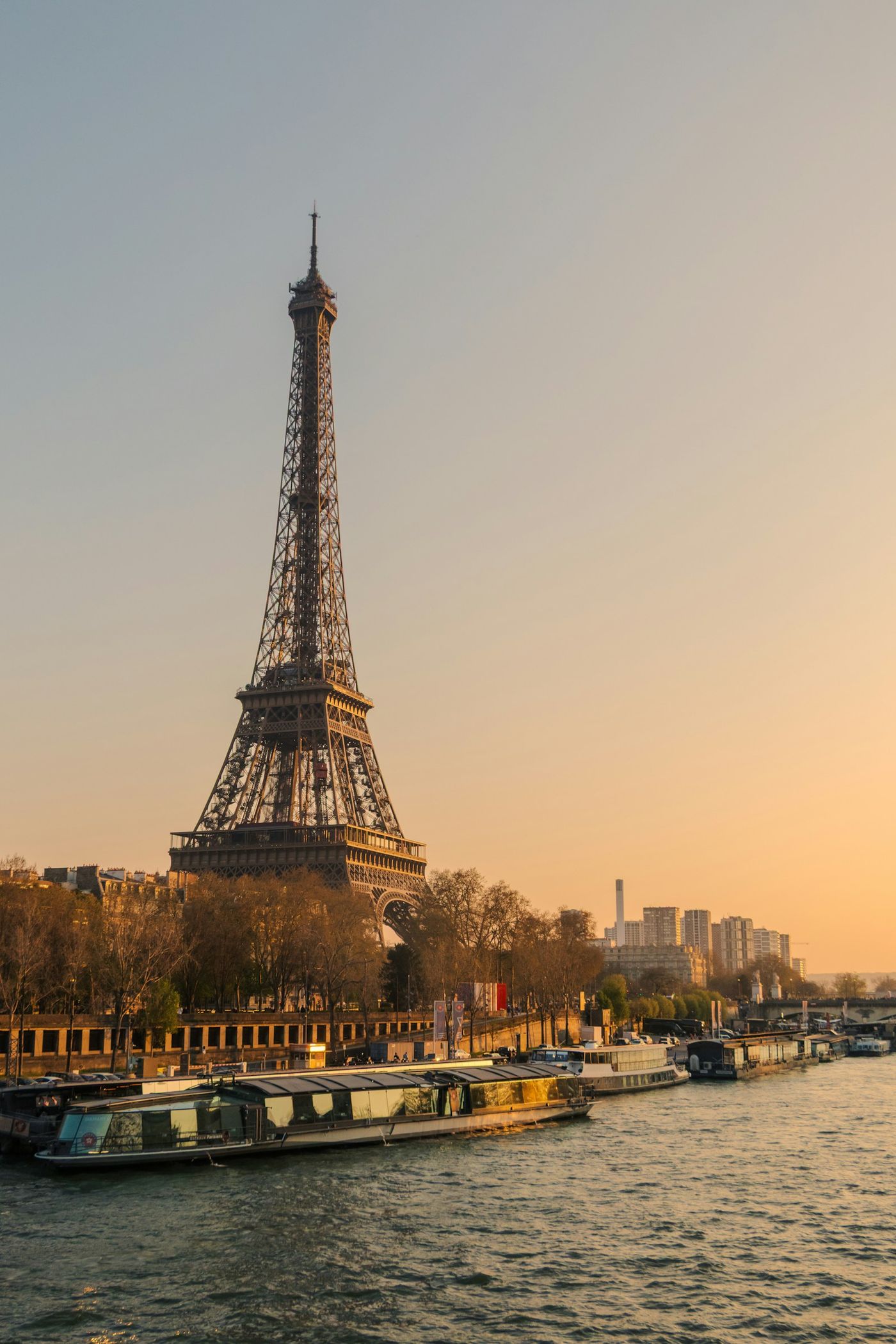 The Eiffel Tower and Seine River in Paris at sunset