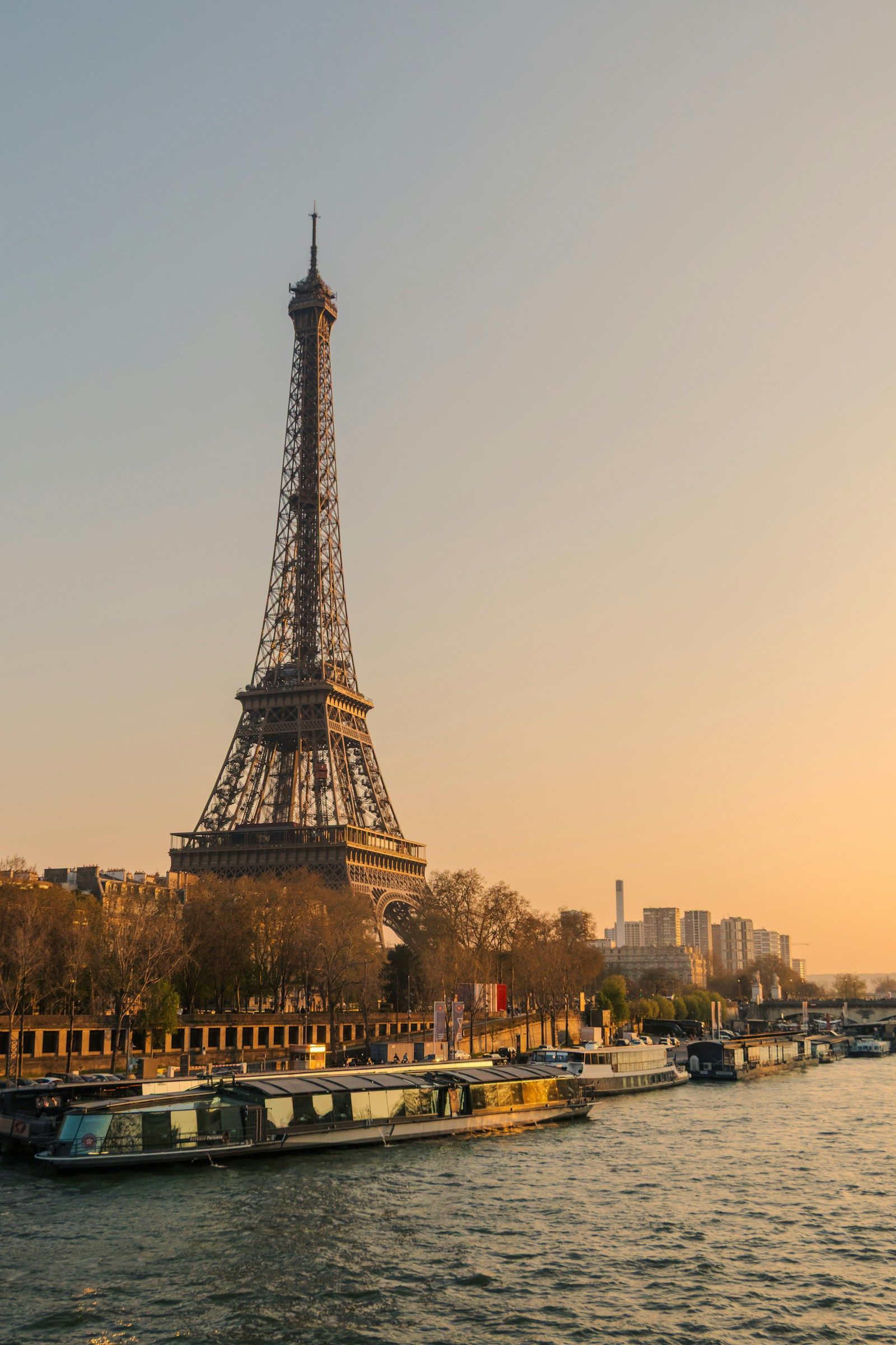 The Eiffel Tower and Seine River in Paris at sunset